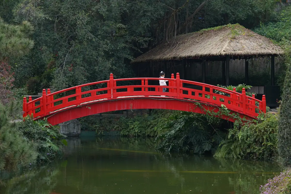Miniature Asian temples reflected in a pond at Window of the World